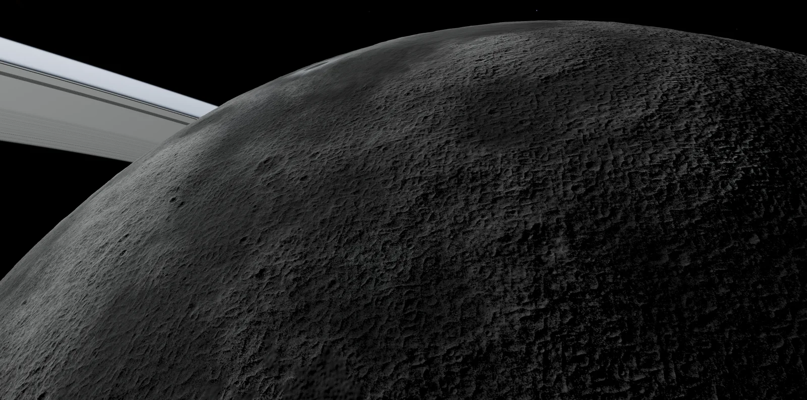Le bord courbe de la lune d’essai, avec les anneaux qui passent derrière.